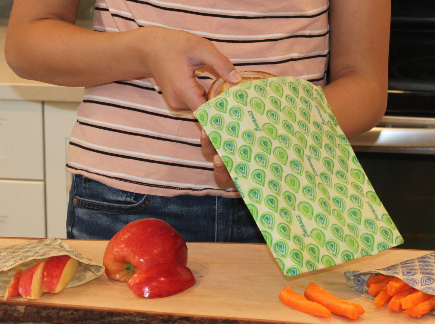 Beeswax wrap and reusable food storage bags by BeeBAGZ are a plastic free alternative to plastic wraps & ziplocked bags for your food storage needs. These beeswax wraps and beeswax wrap bags are a great eco friendly gift and can be used as food wraps, produce bags, snack bags, lunch bags or sandwich bags. Shop today!